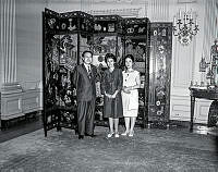 Curator Lorraine Waxman Pearce with Visitors in the State Dining Room