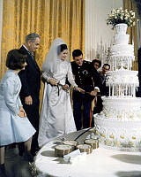 Lynda Johnson and Chuck Robb Cutting Wedding Cake