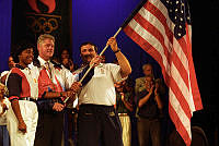 President Clinton Helps Pass the American Flag