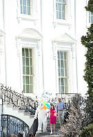 President Obama Descends South Portico Steps with Easter Bunny