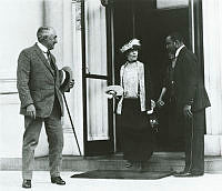 President and Mrs. Harding Bid Goodbye to a White House Employee