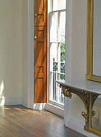 East-Facing Window and Pier Mirror Marble Table