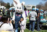The PAAS Easter Bunny Greets a Child at the 2015 Easter Egg Roll
