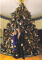 Clintons in Front of the 1996 White House Christmas Tree in the Blue Room