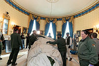 National Park Service Employees Set Up Blue Room Christmas Tree