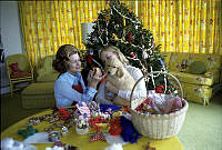 First Lady Betty Ford and Susan Ford Play with Misty